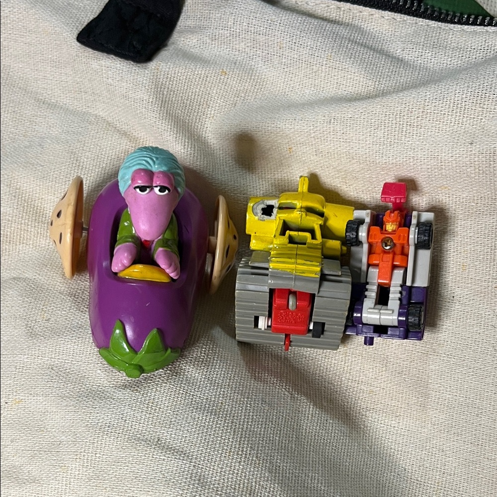 Purple and Yellow Toy Car Duo